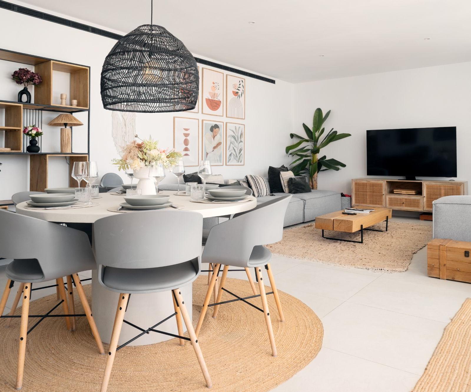 Open living and dining area seen from the terrace side
